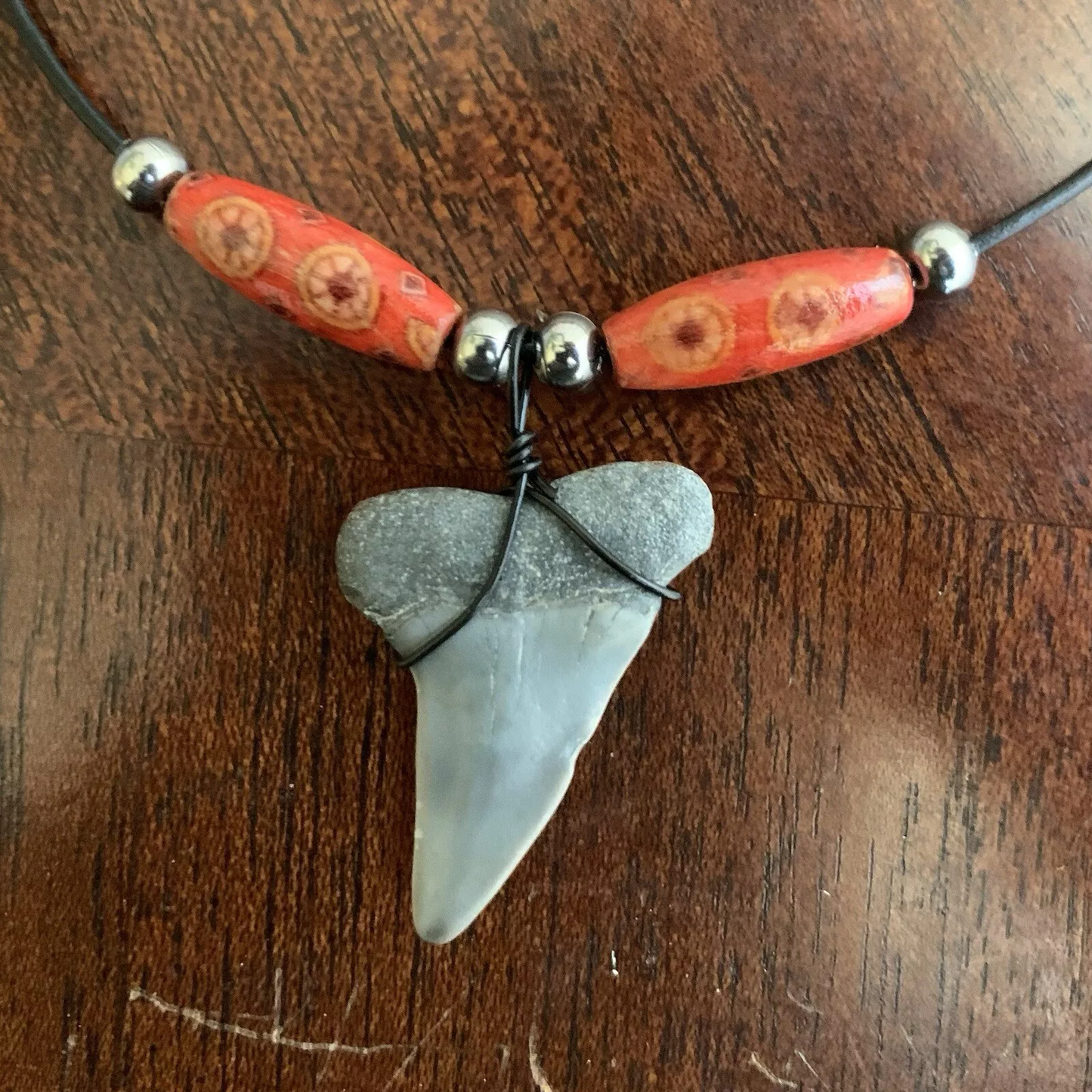 Real fossil Carcharodon hastalis shark tooth necklace on black cord, shark tooth pendant
