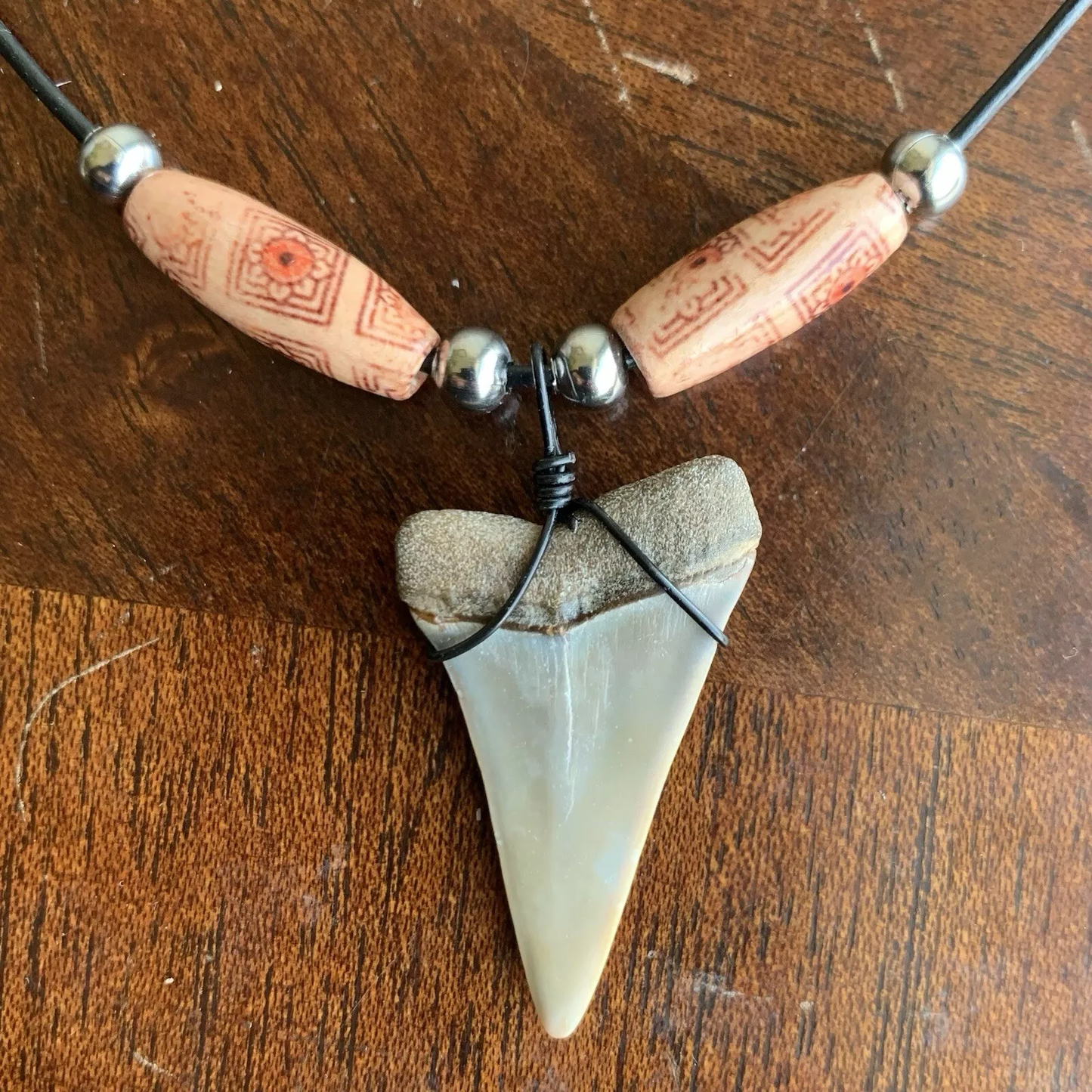 Real fossil Carcharodon hastalis shark tooth necklace on black cord, shark tooth pendant