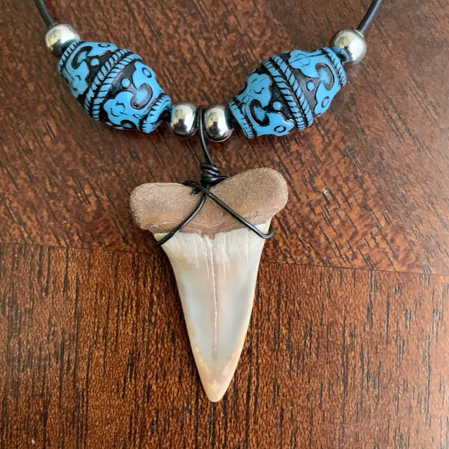Real fossil Carcharodon hastalis shark tooth necklace on black cord, shark tooth pendant