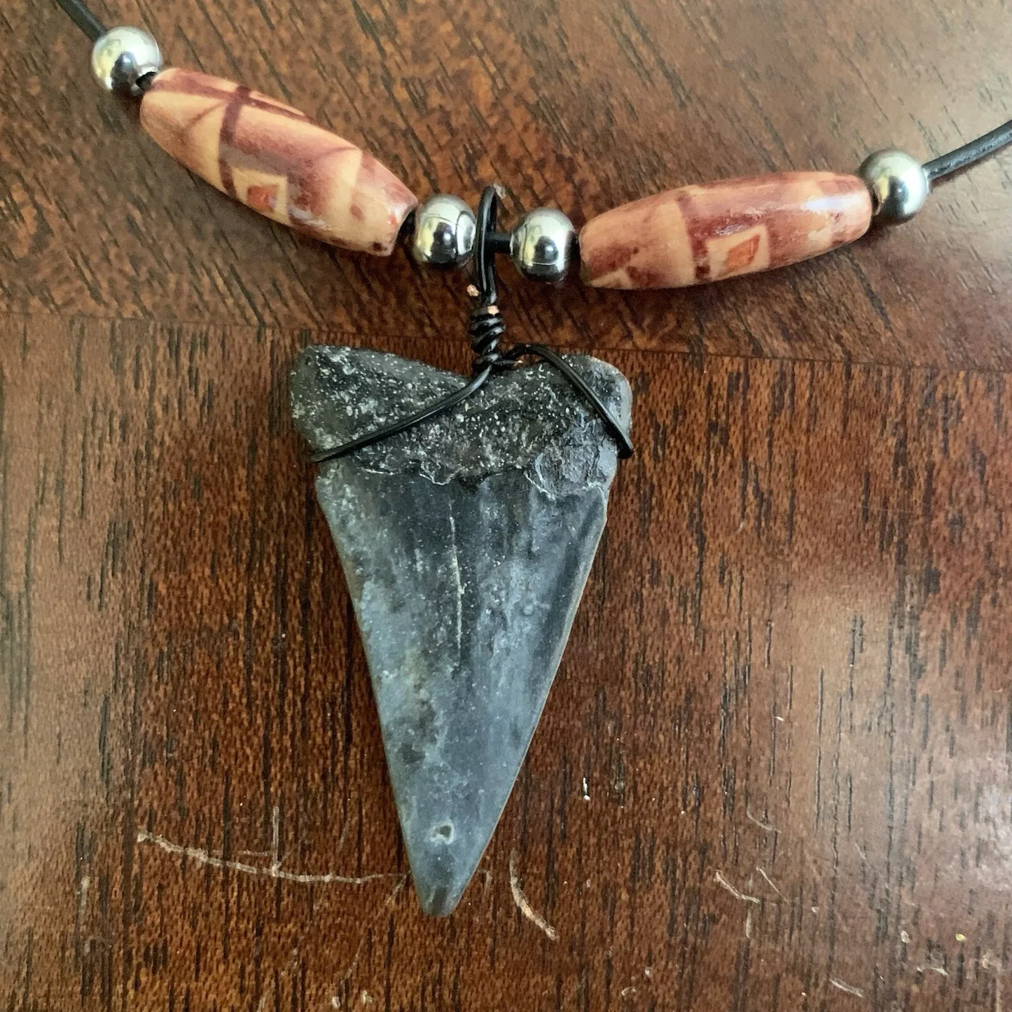 Real fossil Carcharodon hastalis shark tooth necklace on black cord, shark tooth pendant