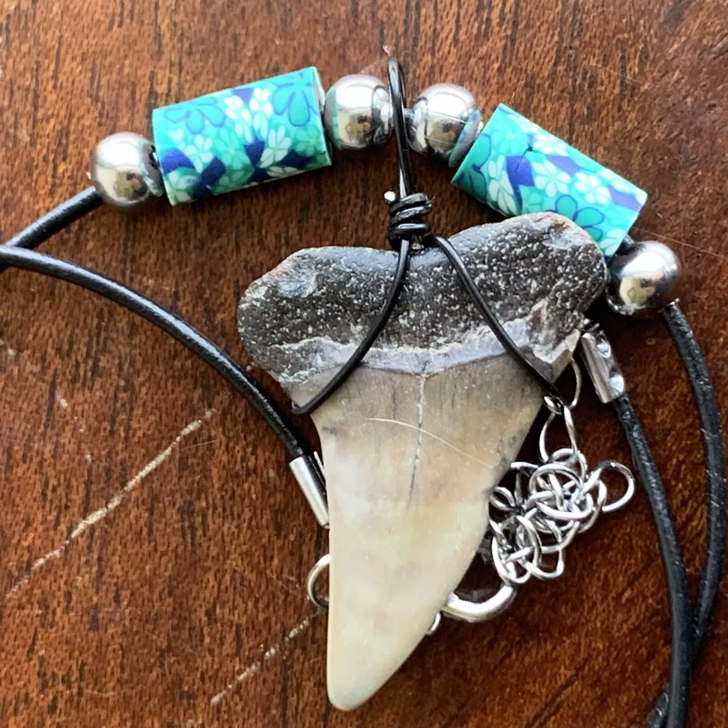 Real fossil Carcharodon hastalis shark tooth necklace on black cord, shark tooth pendant