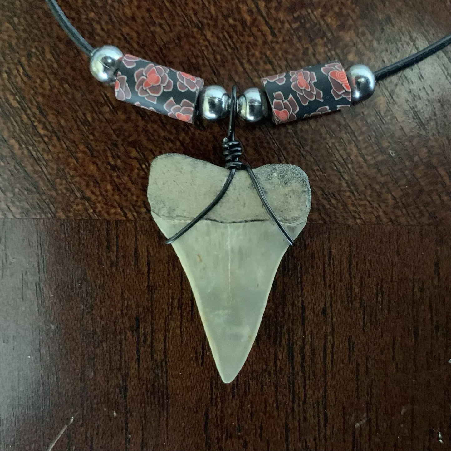 Real fossil Carcharodon hastalis shark tooth necklace on black cord, shark tooth pendant