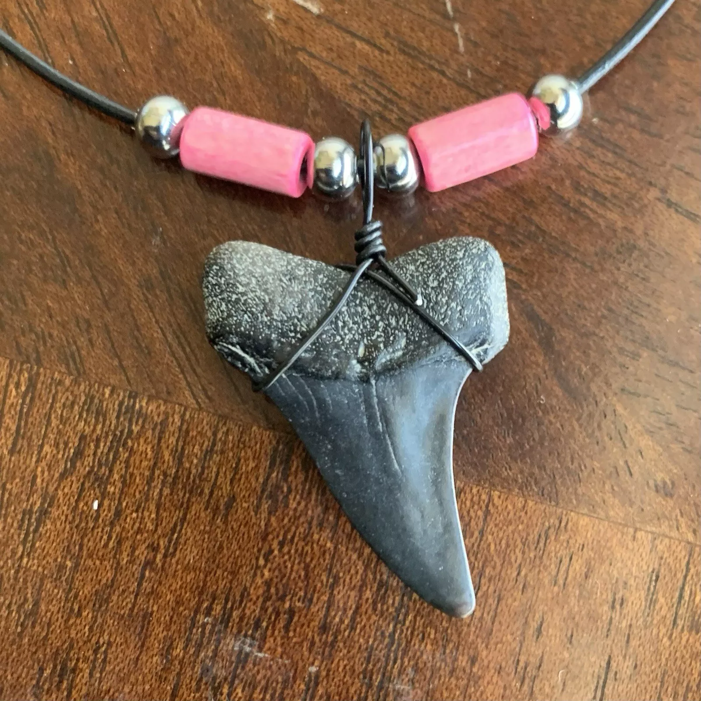 Real fossil Carcharodon hastalis shark tooth necklace on black cord, shark tooth pendant
