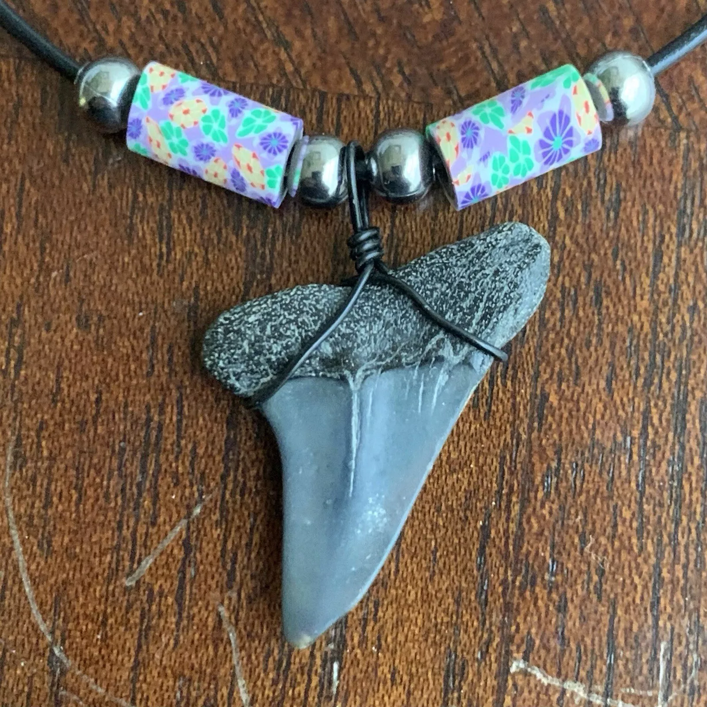 Real fossil Carcharodon hastalis shark tooth necklace on black cord, shark tooth pendant