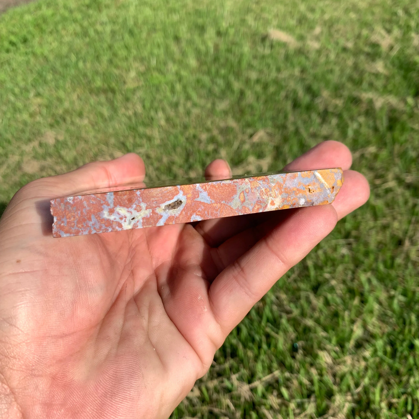 Polished Red Plume Agate slab from Indonesia