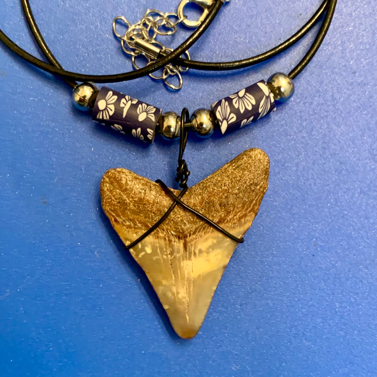 Real fossil megalodon shark tooth necklace on black cord, shark tooth pendant