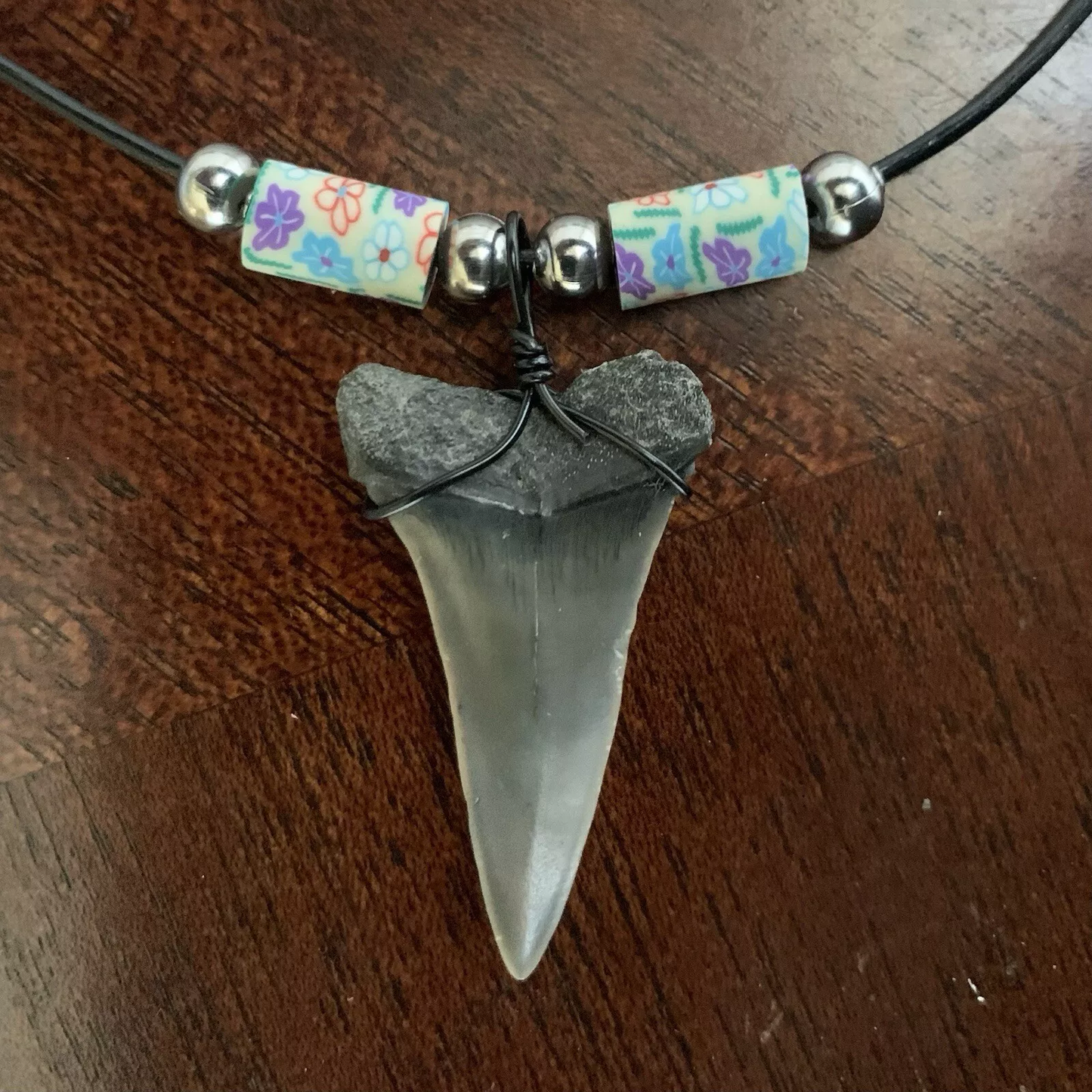 Real fossil Carcharodon hastalis shark tooth necklace on black cord, shark tooth pendant