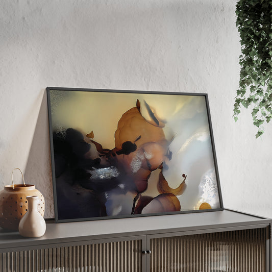 Wall art print capturing a captivating close-up photograph of a Indonesian plume agate with its white, brown and black color. The picture is in a black frame and is leaning against the wall, on a low height cabinet, in the living room.