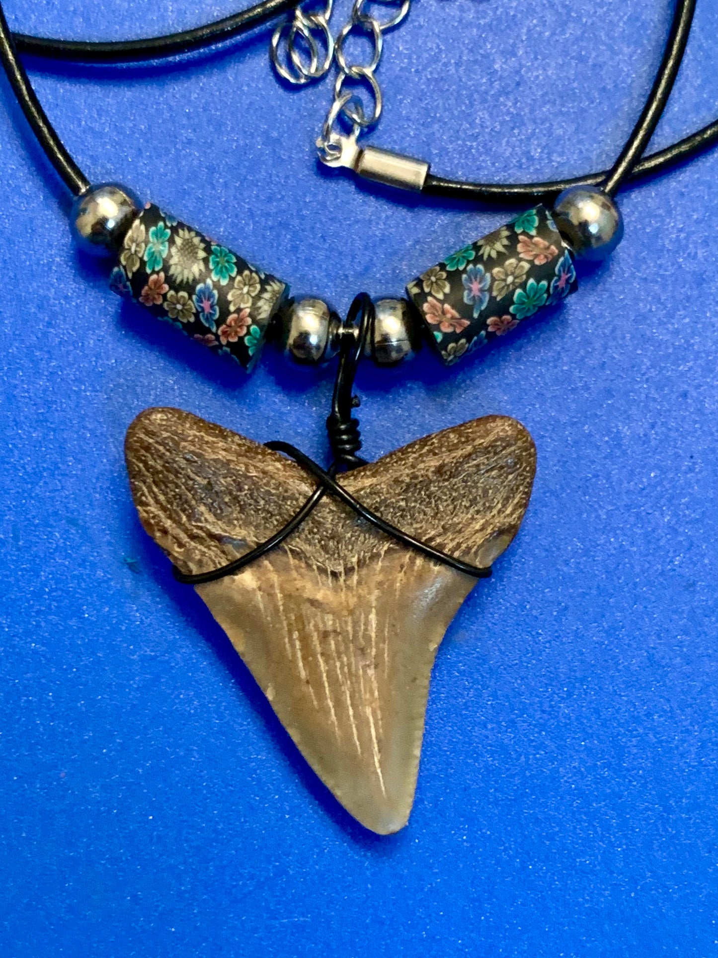 Real fossil megalodon shark tooth necklace on black cord, shark tooth pendant