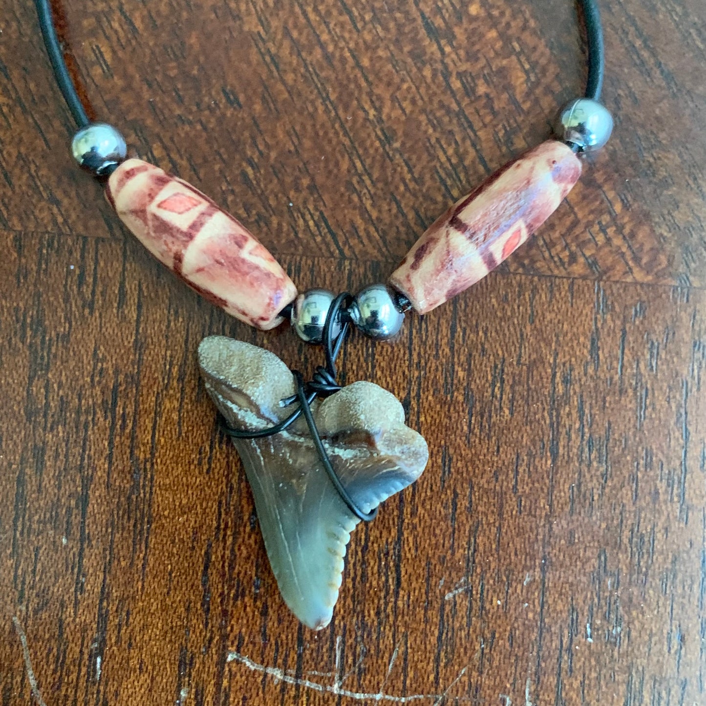 Real fossil Hemipristis serra, snaggle shark tooth necklace on black cord, shark tooth pendant